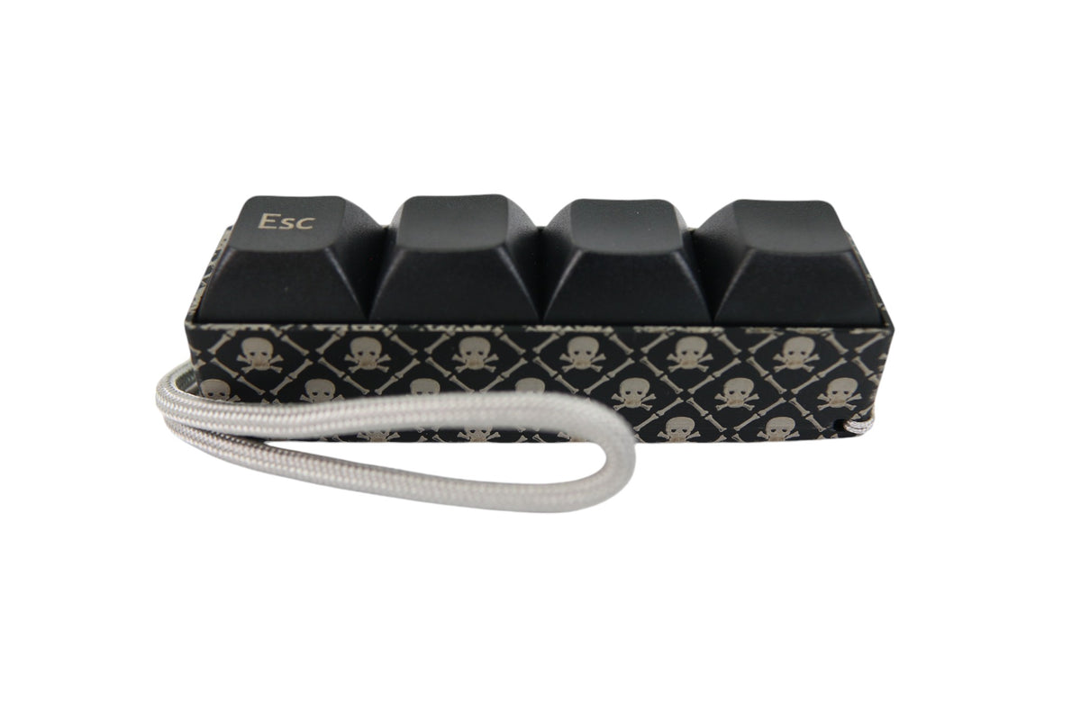 ESC Skull Picky Clicky™ Clicking fidget with smooth decorated sides An ...