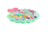 Teal Clam Picky Party Pad and Trinket Dish Satisfy Your Urge to Pick, Pop and Peel Stress-Free!